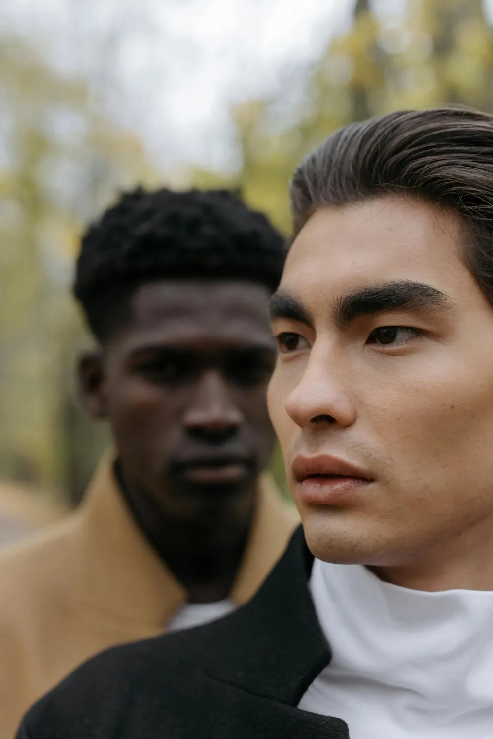 Portrait of two men outdoors